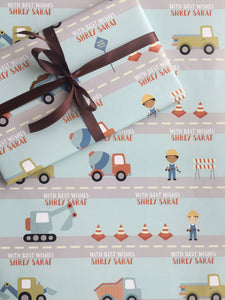 Construction site design personalised wrapping paper for boys with trucks and workers in cute cartoon