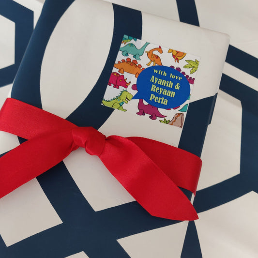 colourful dinosaurs in a personalised gift label