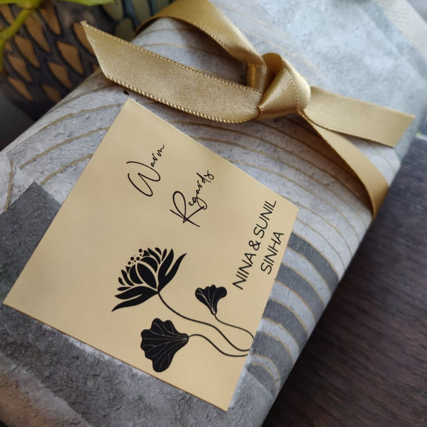 gift label with lots flowers and leaves on golden paper
