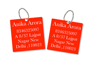 metallic bag tags  in red with personalised information