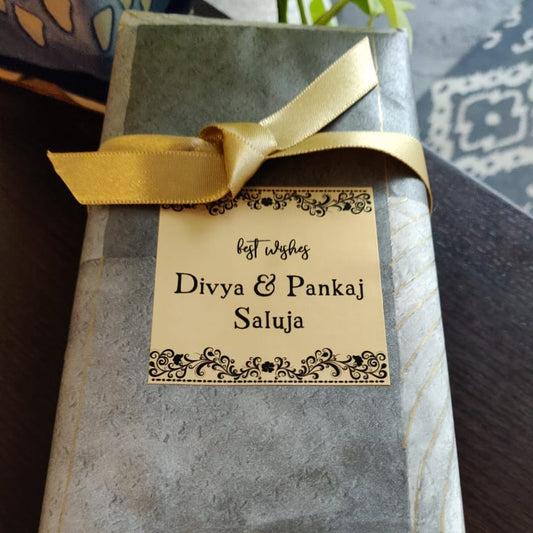 Festive design gift label on golden paper
