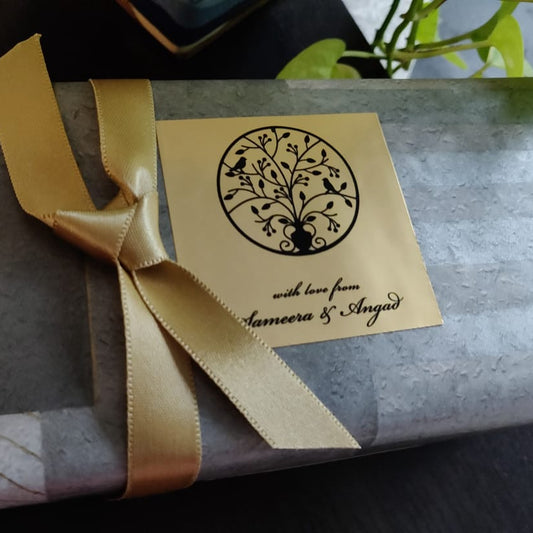 Tree Of life design on a gold paper gift label