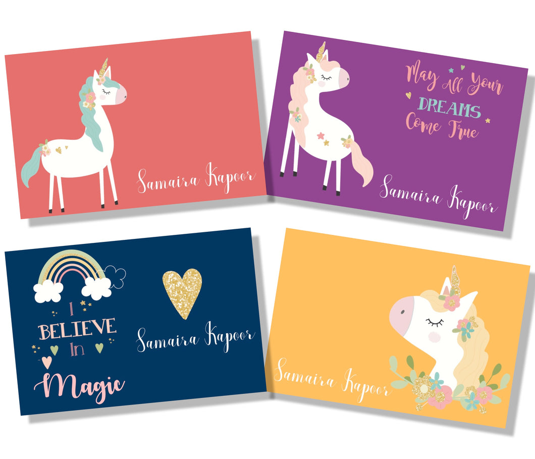 set of gift cards with unicorns and rainbows in floral wreaths in peach, purple, yellow and blue